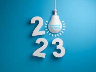 Happy New Year 2023. 3d volumetric numbers 2023 with a light bulb on a blue background. Concept of solutions and technologies. 3d rendering.
